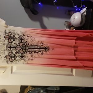 Beautiful print with crystals back and front.By level hem,lloks fabulous on.